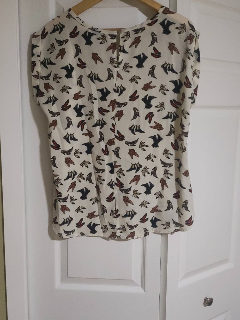 Large White top with boot prints